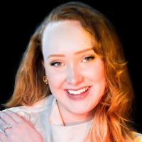 Headshot of Sydney Powell